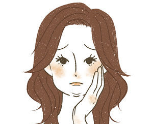 顔のむくみに悩む女性